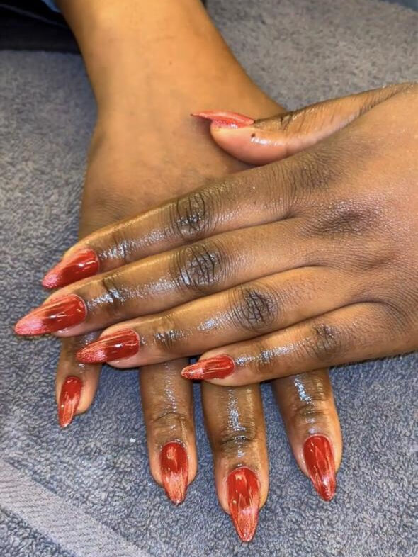 Gel X nails — red shimmer coffin shape