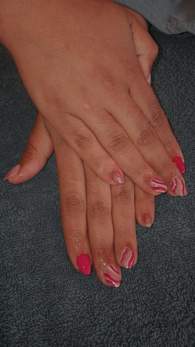 Gel X nails — pink and white swirl short set