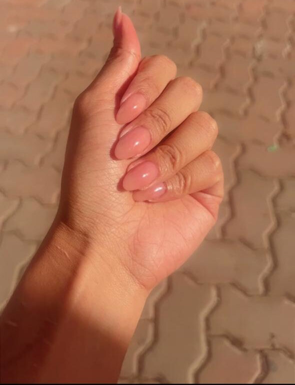 Rubber base manicure — nude with gold foil accent